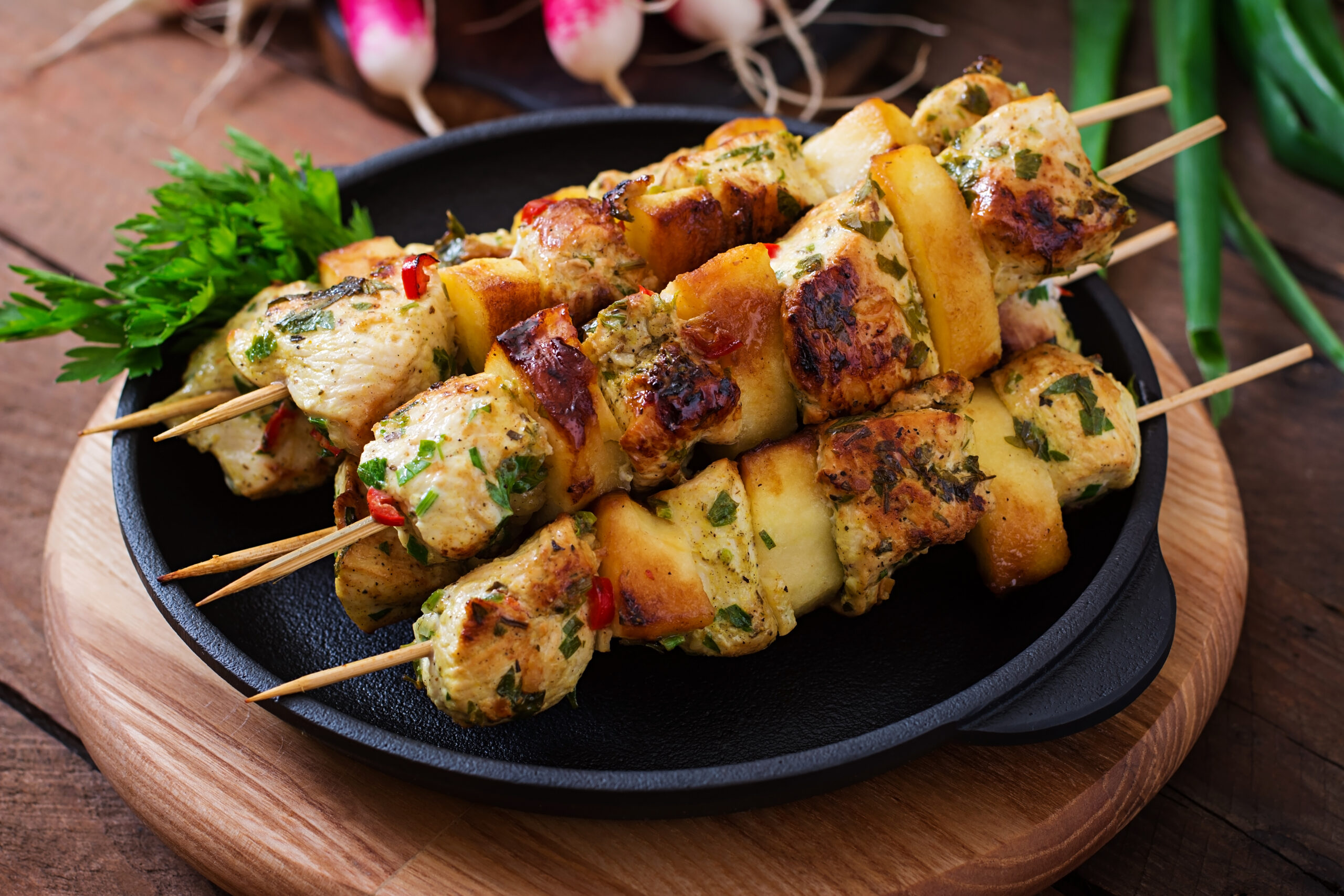 Chicken skewers with slices of apples and chili Chicken skewers with slices of apples and chili